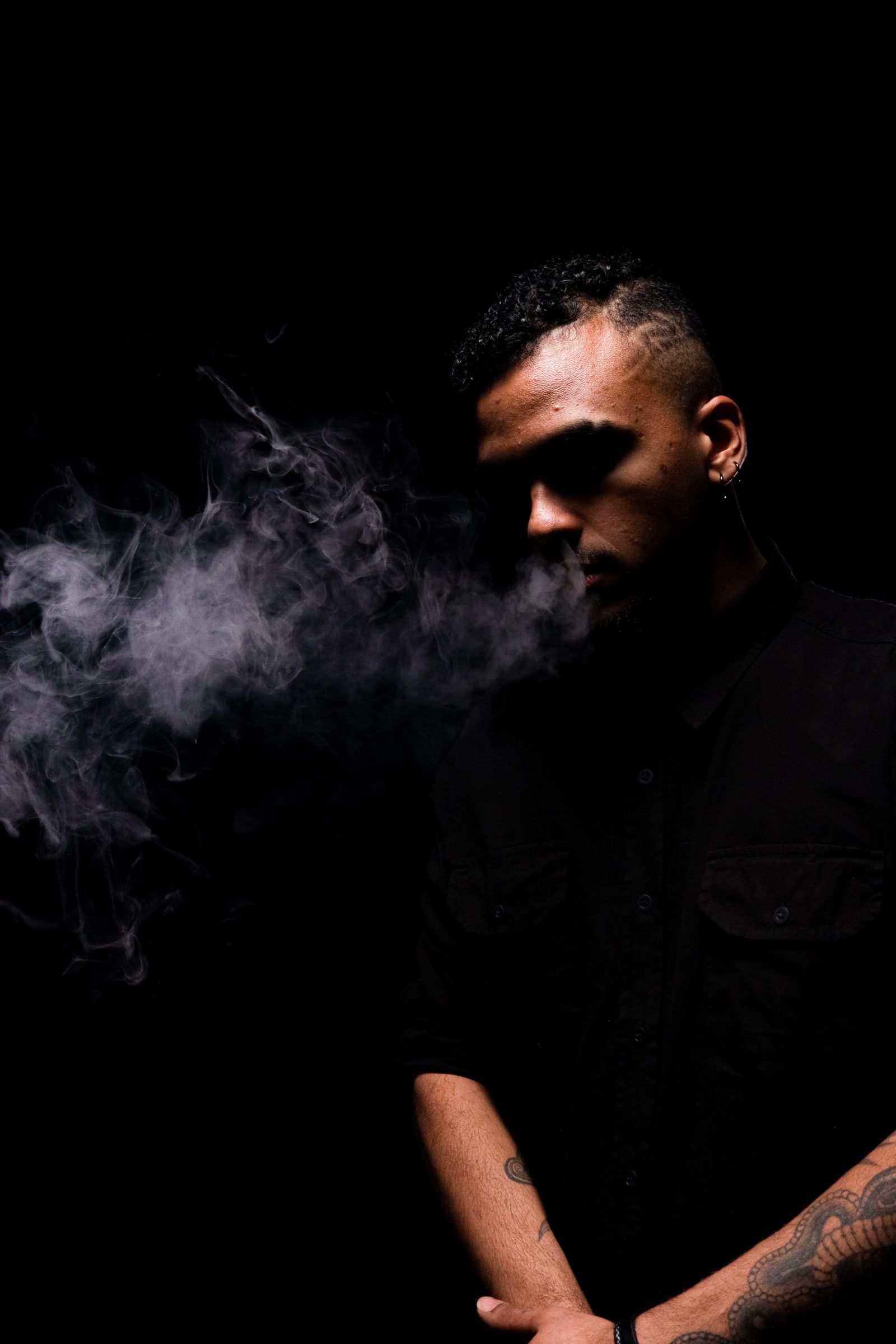 8K bassist in smoke, 2024 promo session